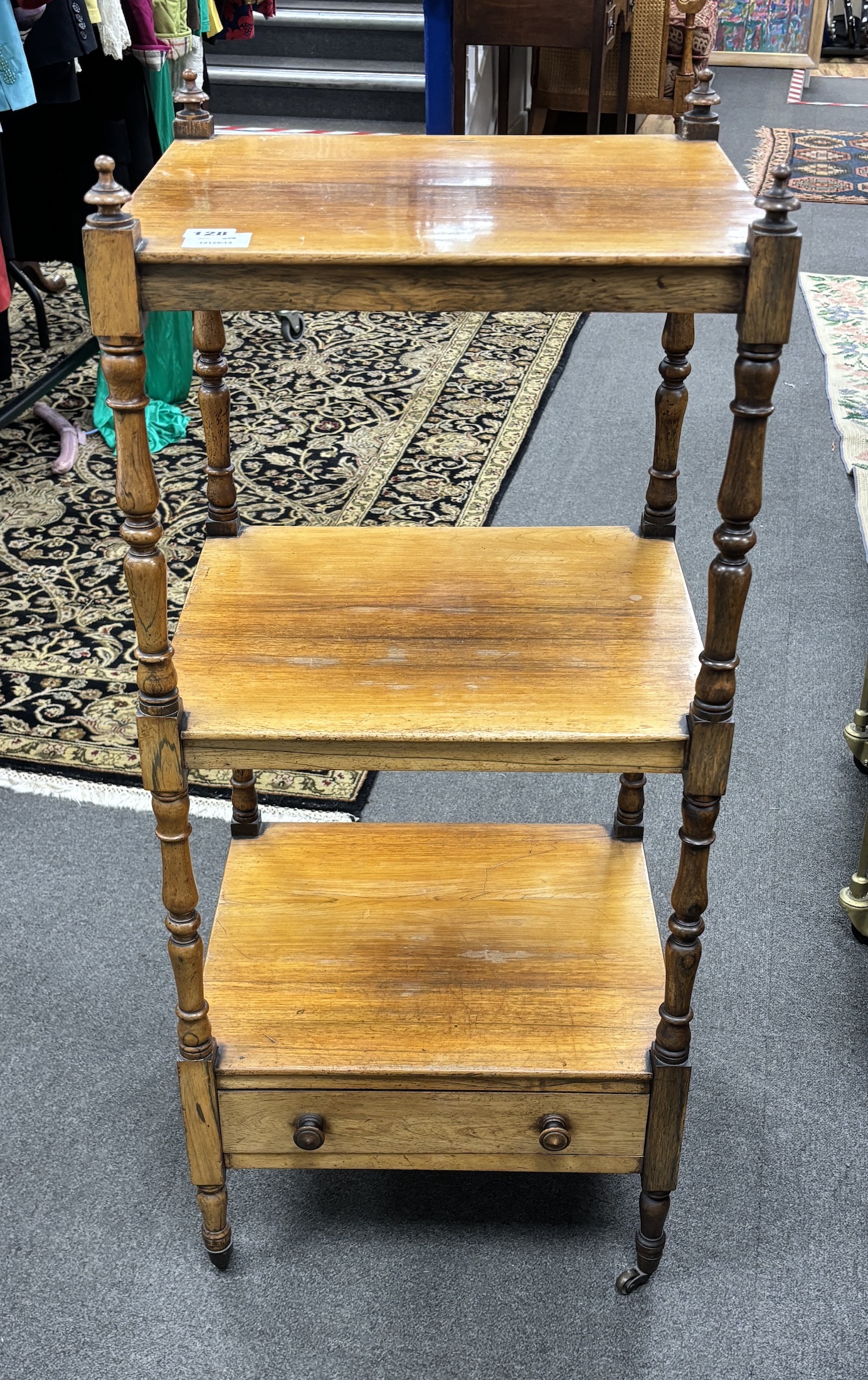 A Victorian rosewood three tier whatnot, width 43cm, depth 38cm, height 101cm